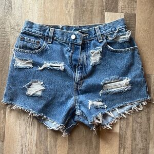 Vintage Levis high rise distressed jean shorts 550